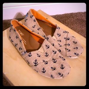 Toms coastal themed shoes.
